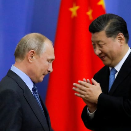 Xi Jinping pictured with Vladimir Putin in St Petersburg in 2019. Photo: Reuters