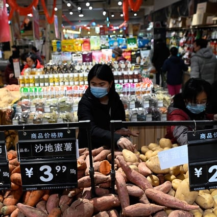 China’s consumer price index (CPI) eased to minus 0.2 per cent in February from a year earlier, from minus 0.3 per cent in January. Photo: AFP