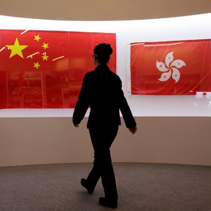 The flags of China and Hong Kong used during the 1997 Hong Kong handover ceremony are displayed at the National Museum of China in Beijing in June 2017. Photo: Reuters