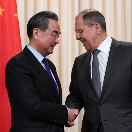Wang Yi and Sergei Lavrov (pictured together in 2018) are set to meet in Beijing on Monday. Photo: AFP