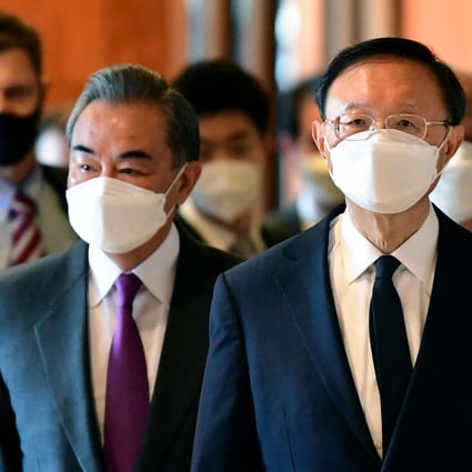 Yang Jiechi, right, director of the Central Foreign Affairs Commission Office for China, and Wang Yi, left, China's foreign affairs minister, arrive for a meeting with US counterparts at the opening session of US-China talks at the Captain Cook Hotel in Anchorage, Alaska. Photo: AFP