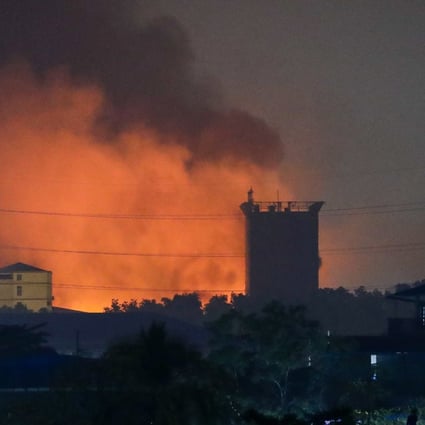 A fire burns at a Chinese-owned factory in Hlaingthaya township, on the outskirts of Yangon, Myanmar. Photo: EPA