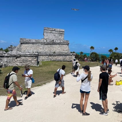 Tourists visit the pre-Columbian Mayan site of Tulum in the Mexican state of Quintana Roo. Photo: AFP