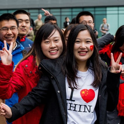 Chinese students wait to greet President Xi Jinping on a 2015 visit to Manchester University. Britain is the most favoured academic destination for Chinese students, according to a recent survey. Photo: AFP