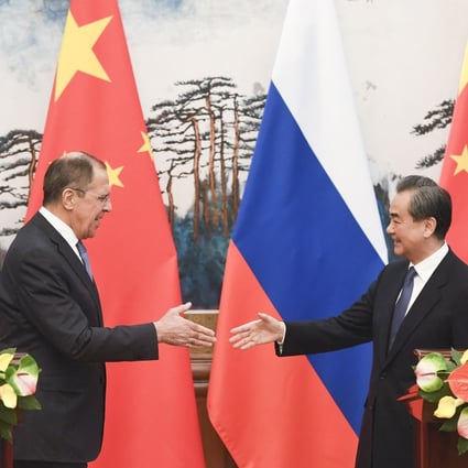 Russia and China’s foreign ministers Sergei Lavrov and Wang Yi in Beijing in April 2018. Photo: AFP