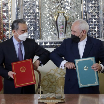 Iranian foreign minister Mohammad Javad Zarif and Chinese foreign minister Wang Yi have signed a 25-year Iran and China strategic partnership act. Photo: EPA-EFE