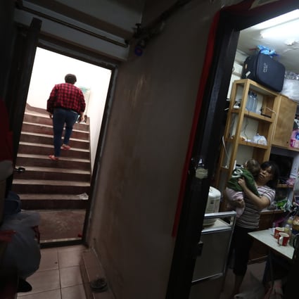 Occupants of Hong Kong’s subdivided flats are often poor families whose income growth lags rent rises. Photo: Jonathan Wong