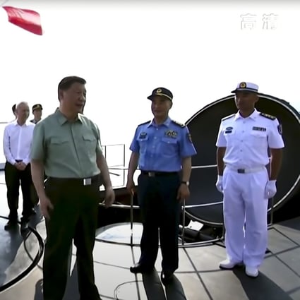 China’s President Xi Jinping stands aboard the Type 094A nuclear-powered ballistic missile submarine. Source: CCTV