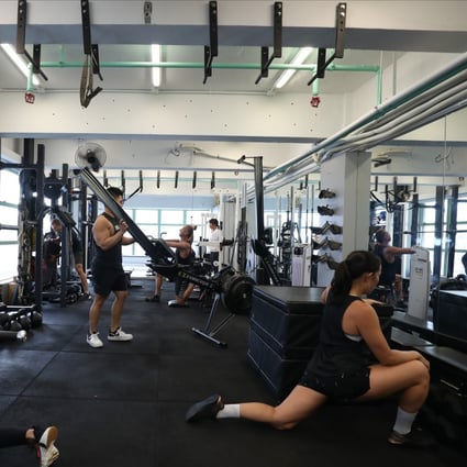 Gym goers work out at a gym in Central on September 18, 2020. Given that major outbreaks in Hong Kong have been linked to bars with live bands, dance halls, restaurants and gyms, ventilation in buildings needs to more rigorously monitored. Photo: Xiaomei Chen