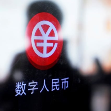 A sign indicating digital yuan, also referred to as e-renminbi, is pictured on a vending machine at a subway station in Shanghai on April 21. Photo: Reuters