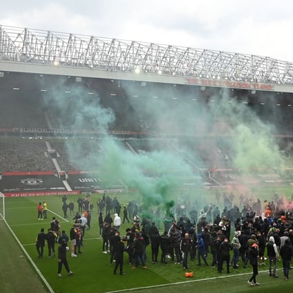 Supporters protest against Manchester United’s owners, the Glazer family, inside Old Trafford stadium in Manchester, UK on Sunday. Photo: AFP