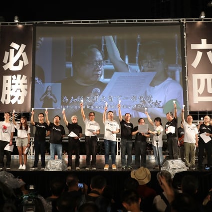 Albert Ho (centre) among alliance members on stage at the 2019 event, the last time the annual vigil was allowed to proceed. Photo: Sam Tsang
