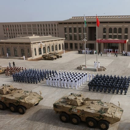 Chinese PLA personnel attend the opening ceremony of China's military base in Djibouti. Photo: AFP