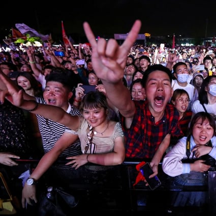 Fans attend the Strawberry Music Festival in Wuhan during the Labour Day holiday on May 1. People in China are going mask-free and partying again after months of pandemic restrictions last year. Photo: Reuters