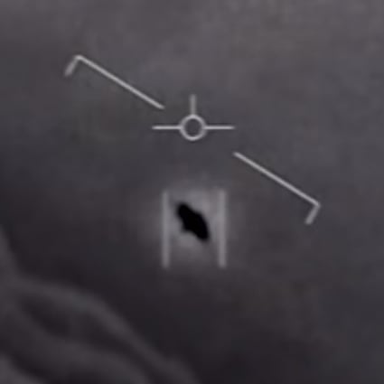 A screen grab from an unclassified video taken by US Navy pilots shows an interactions with an “unidentified aerial phenomena”. Image: US Department of Defence via AFP