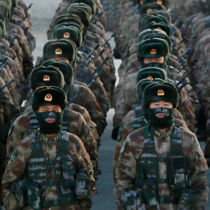 People's Liberation Army soldiers assemble during military training at the Pamir Mountains in Kashgar, Xinjiang Uygur autonomous region, on January 4. China needs to allay fears that it will use its growing military might to cow its neighbours. Photo: AFP