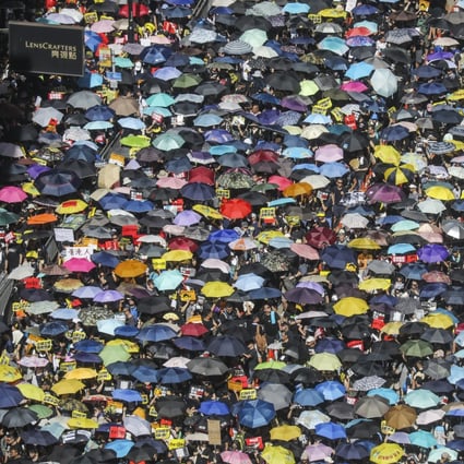 Protesters march from Victoria Park in Causeway Bay on the 22nd anniversary of Hong Kong's handover from Britain to China. Photo: Dickson Lee