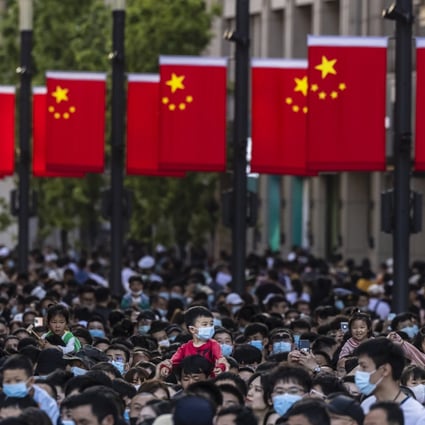 People walk to the Bund during Labour Day in Shanghai on May 1. Photo: EPA-EFE