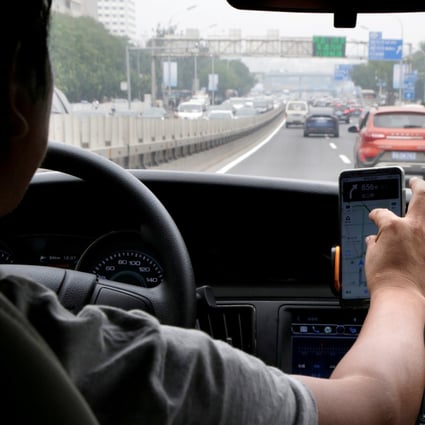 A Didi Chuxing driver on the job in Beijing, China on August 28, 2018. Photo: Reuters