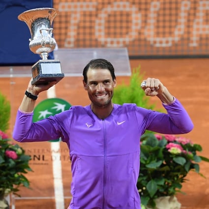 Rafael Nadal of Spain poses with his trophy after winning his men’s singles final against Novak Djokovic of Serbia at the Italian Open tennis tournament in Rome, Italy on Sunday. Photo: EPA-EFE