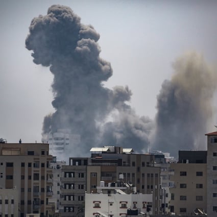 Smoke rises after an Israeli air strike on Sunday which killed 13 Palestinians and wounded more than 40. Photo: EPA-EFE