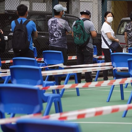Hongkongers queue for Covid-19 screenings at a mobile testing centre in April. Photo: Winson Wong