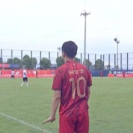 A screenshot shows Zibo Cuju owner He Shihua (No 10) come on as a substitute for his club in their China League One game against Xinjiang Tianshan Leopards on May 24, 2021. Photo: Twitter/Titan Sports