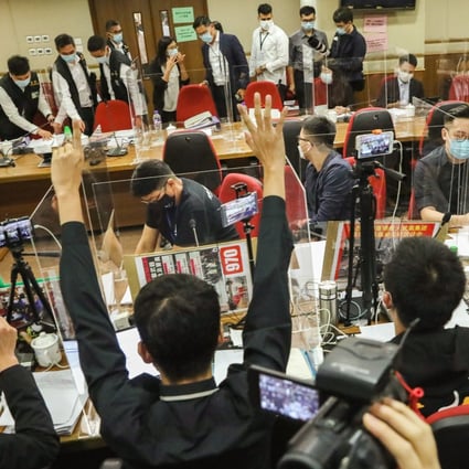 Anti-government protesters at a meeting of the Yau Tsim Mong district council attended by Commissioner of Police Chris Tang Ping-keung in September last year. Photo: May Tse