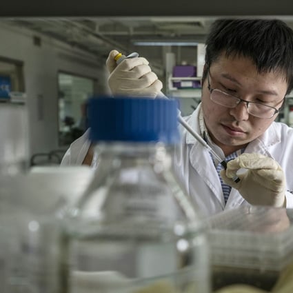 A researcher prepares a sample inside a laboratory at BeiGene Ltd’s research and development centre in Beijing on May 24, 2018. The company made its Hong Kong trading debut in August 2018. Photo: Bloomberg
