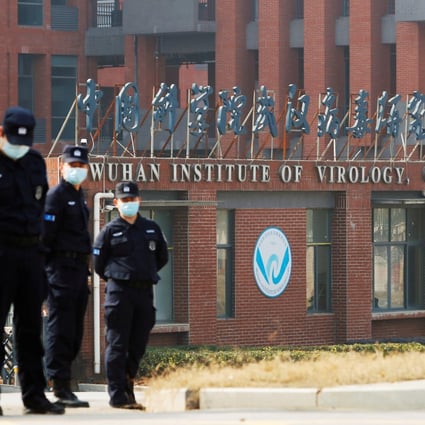 Security personnel keep watch outside Wuhan Institute of Virology during the visit by the World Health Organization team tasked with investigating the origins of the coronavirus disease in Wuhan, China on February 3. Photo: Reuters