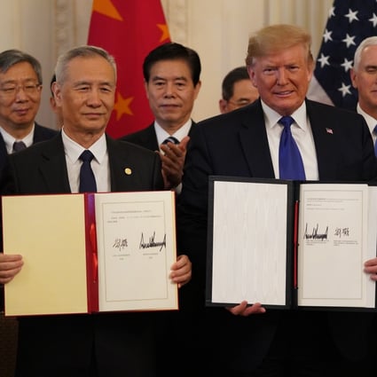 Then-US president Donald Trump and Chinese Vice-Premier Liu He signed the phase-one trade deal in January 2020. Photo: Xinhua