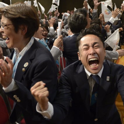 Members of the Japanese delegation to the International Olympic Committee celebrate in 2013 after Tokyo won its bid to host the 2020 Summer Olympic Games. Photo: AFP
