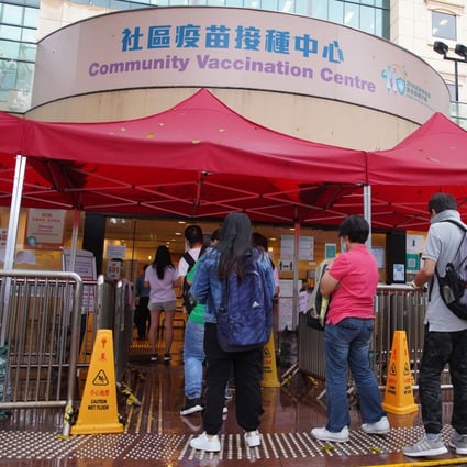 People line up at a community vaccination centre offering the Sinovac vaccine outside Hong Kong Central Library on May 3. Photo: Winson Wong
