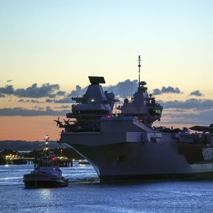 HMS Queen Elizabeth departs the naval base in Portsmouth, England, on May 22. HMS Queen Elizabeth will be leading a 28-week deployment to Asia that Prime Minister Boris Johnson has insisted is not confrontational towards China. Photo: PA via AP