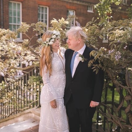 UK Prime Minister Boris Johnson and his wife Carrie in the garden of 10 Downing Street, London, after their wedding. Photo: Rebecca Fulton via Reuters