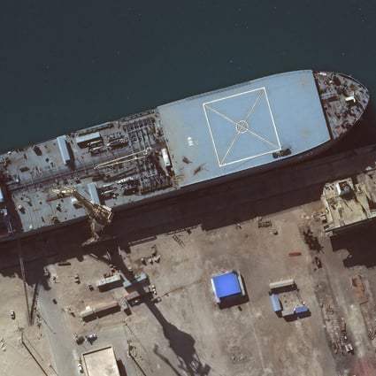 Iranian media has claimed the Makran, which was commissioned this year, can serve as a platform for electronic warfare and special operations missions. Satellite image: Maxar Technologies handout via Reuters