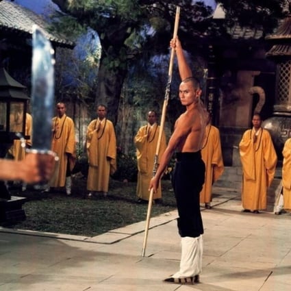 Gordon Liu (right) in a still from The 36th Chamber of Shaolin, the 1978 film in which he played a bald-headed monk and which made his name as a martial arts actor.
