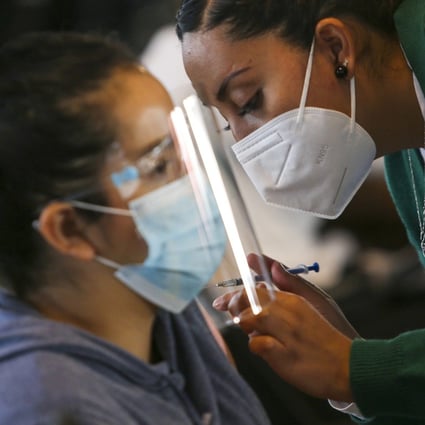 A health worker applies a dose of CanSino’s vaccine in Mexico, one of the countries that has already started buying Chinese vaccines. Photo: Reuters