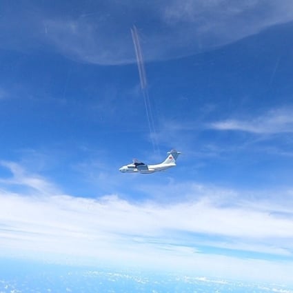 A plane with a Chinese flag on its tail in a picture supplied by the Royal Malaysian Air Force on Monday. Photo: Reuters