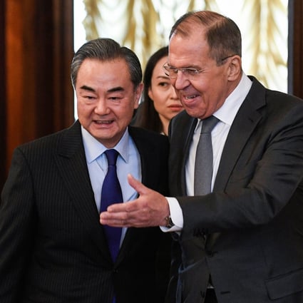 Chinese Foreign Minister Wang Yi (left) thanked his Russian counterpart Sergey Lavrov (right) for his stand against the US on the origins of the coronavirus. Photo: AFP