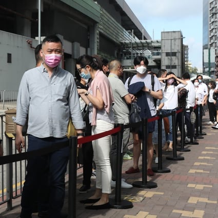 Potential buyers queue up to buy flats at the South Land property project near Wong Chuk Hang MTR station on May 15, 2021. Photo: Xiaomei Chen