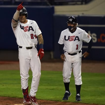 USA centre fielder Jarren Duran (24) gestures to the dugout after a single in the fifth inning against Venezuela. USA beat Venezuela to qualify for the Tokyo 2020 Games. Photo: USA Today