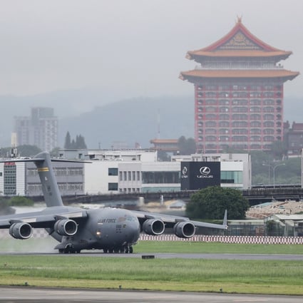 A delegation of US senators arrive in a military plane at Taipei Songshan Airport on Sunday. Photo: Reuters