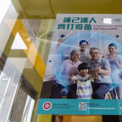 A poster promotes Hong Kong’s Covid-19 inoculation programme outside a community centre on administering the BioNTech vaccine. Bookings for children aged 12 and above opened on June 10. Photo: Bloomberg