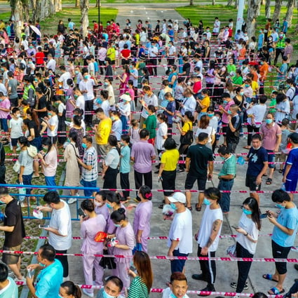 Residents line up to get tested in the township of Changan in Dongguan on Saturday. Photo: VCG