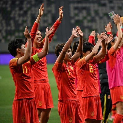 China's team celebrate their victory during the qualifying play-off second leg women's football match for the Tokyo 2020 Olympic Games between China and South Korea at Suzhou Olympic Sports Centre Stadium in Suzhou. Photo: AFP
