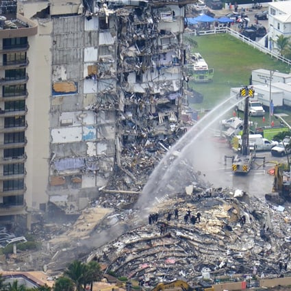 Rescue personnel work at the remains of the Champlain Towers South building in Surfside, Florida. Photo: AP