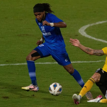 Hong Kong Premier League side Lee Man captain Fernando Recio challenges Benchy Estama of Taiwan's Tainan City in the AFC Cup at Tseung Kwan O Sports Ground. Photo: HKFA