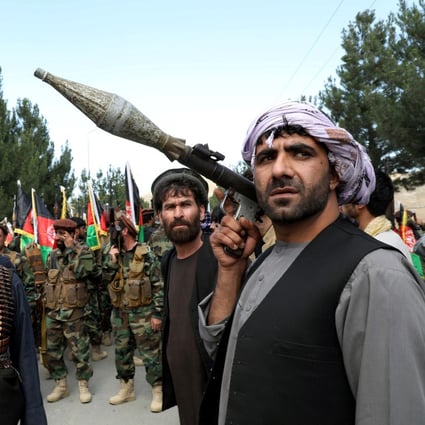 Anti-Taliban fighters and government troops on the outskirts of Kabul. The US withdrawal has led to a surge in attacks. Photo: Reuters