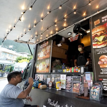 A diner at a food truck in Tai Mei Tuk, Tai Po. Photo: Felix Wong